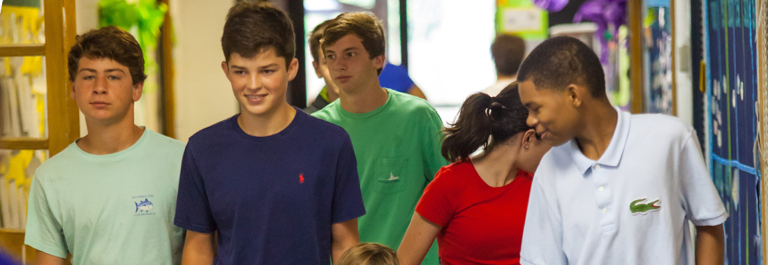 Students walking down a hall together