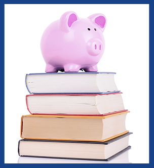 Piggy bank on top of a stack of books